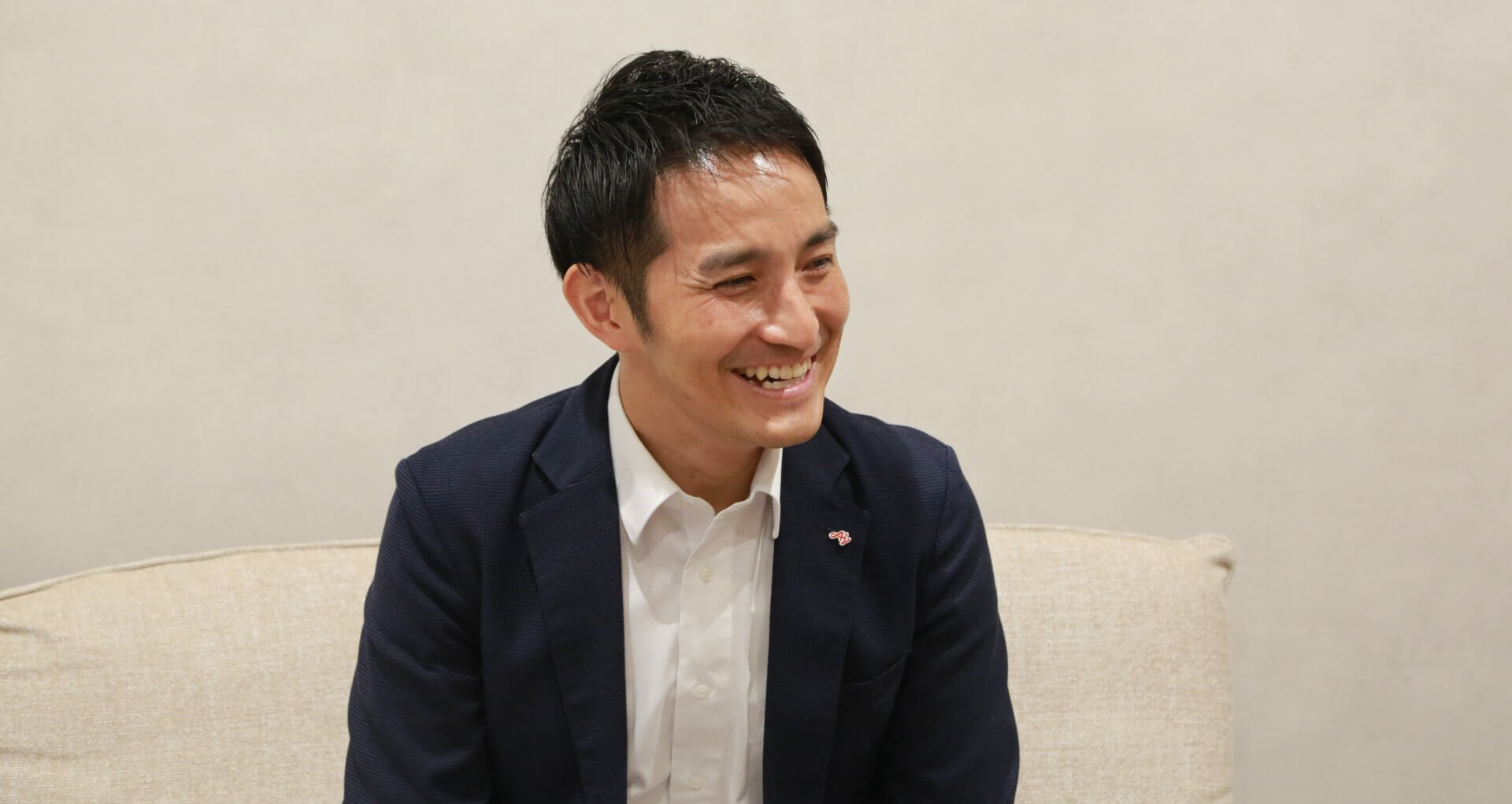 Takeuchi explaining the positive impacts of the new initiative