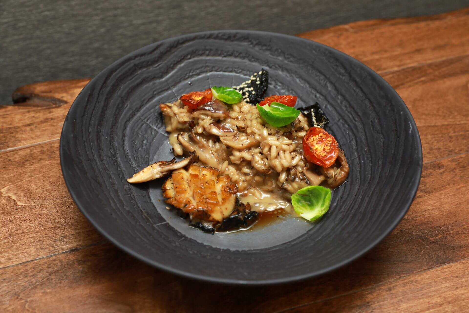 Butter Poached Abalone, served with roasted mushroom risotto